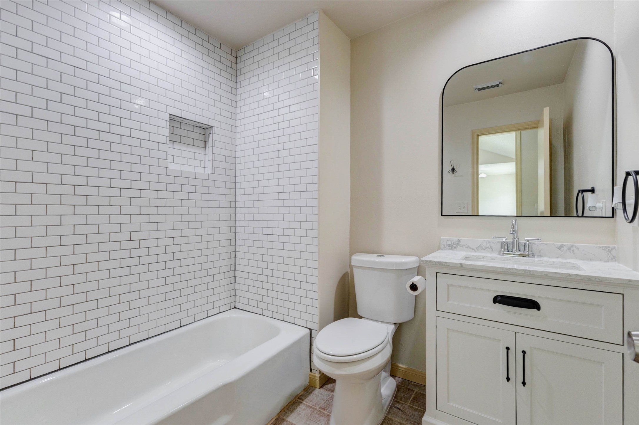 5319 Ridgestone Street Houston, TX 77053 - Photo 14 of 26 a bathroom with a sink a toilet and shower