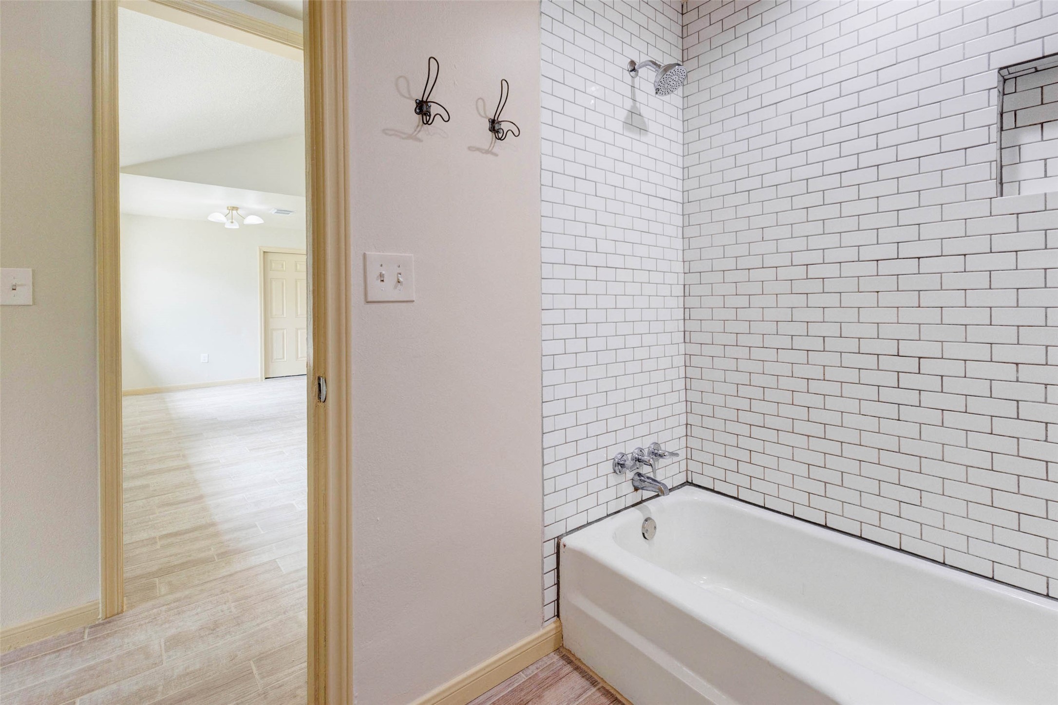 5319 Ridgestone Street Houston, TX 77053 - Photo 15 of 26 a bathroom with a bathtub and shower
