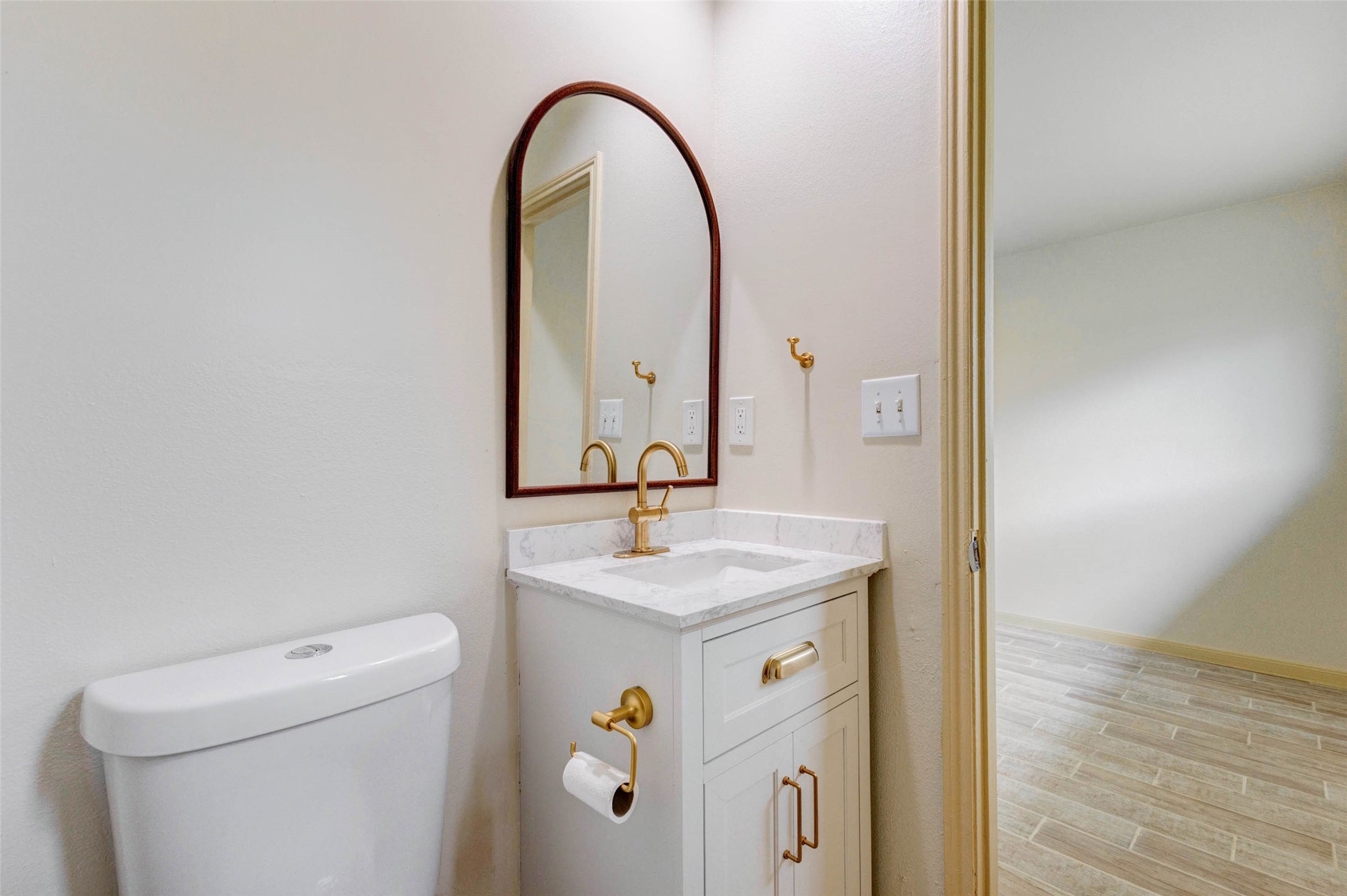 5319 Ridgestone Street Houston, TX 77053 - Photo 16 of 26 a bathroom with a sink and a mirror