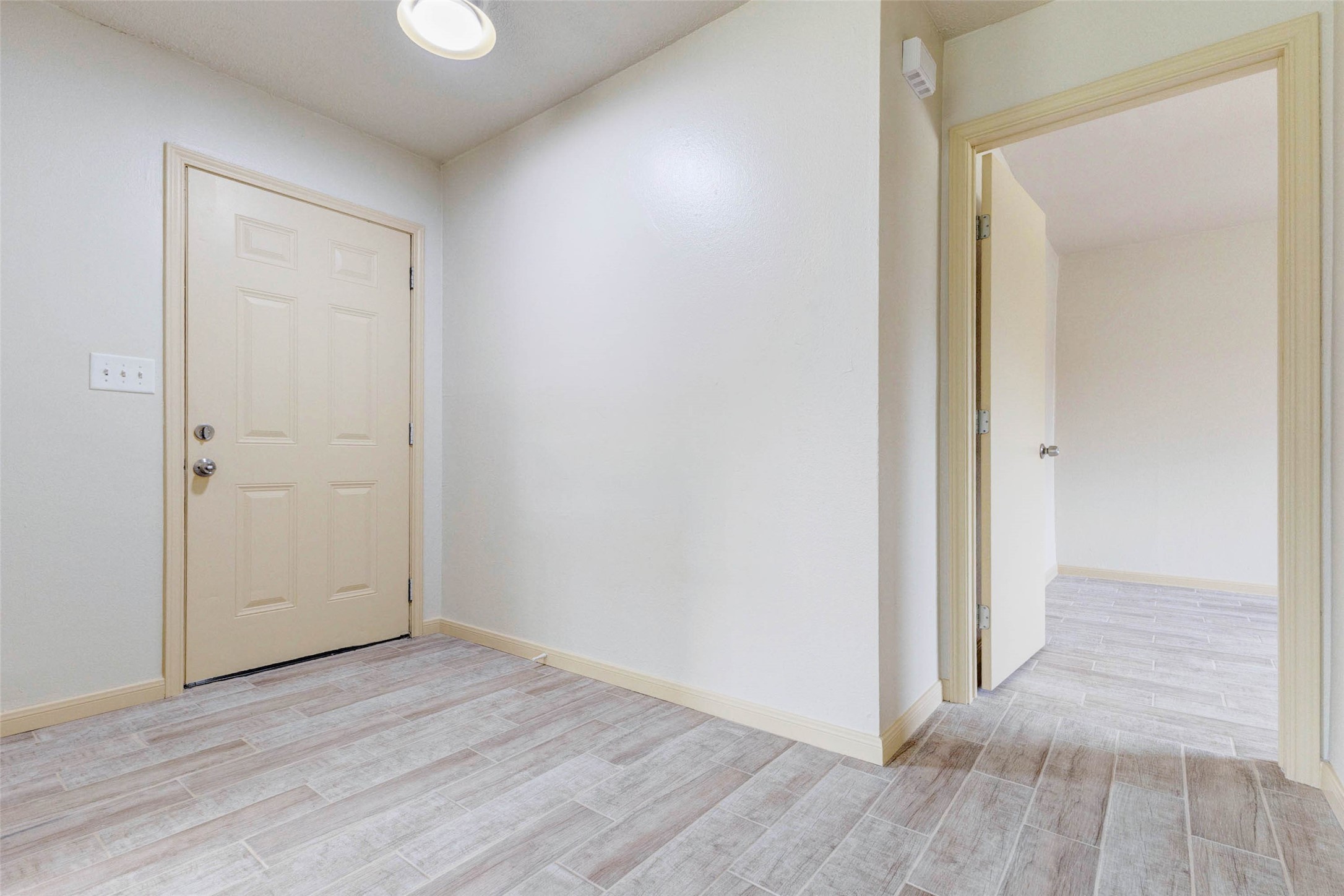 5319 Ridgestone Street Houston, TX 77053 - Photo 19 of 26 an empty room with wooden floor & closet area