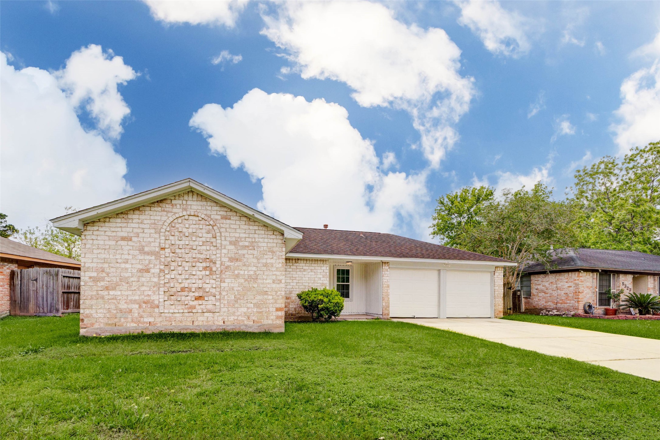 5319 Ridgestone Street Houston, TX 77053 - Photo 2 of 26 a view of a house with a backyard