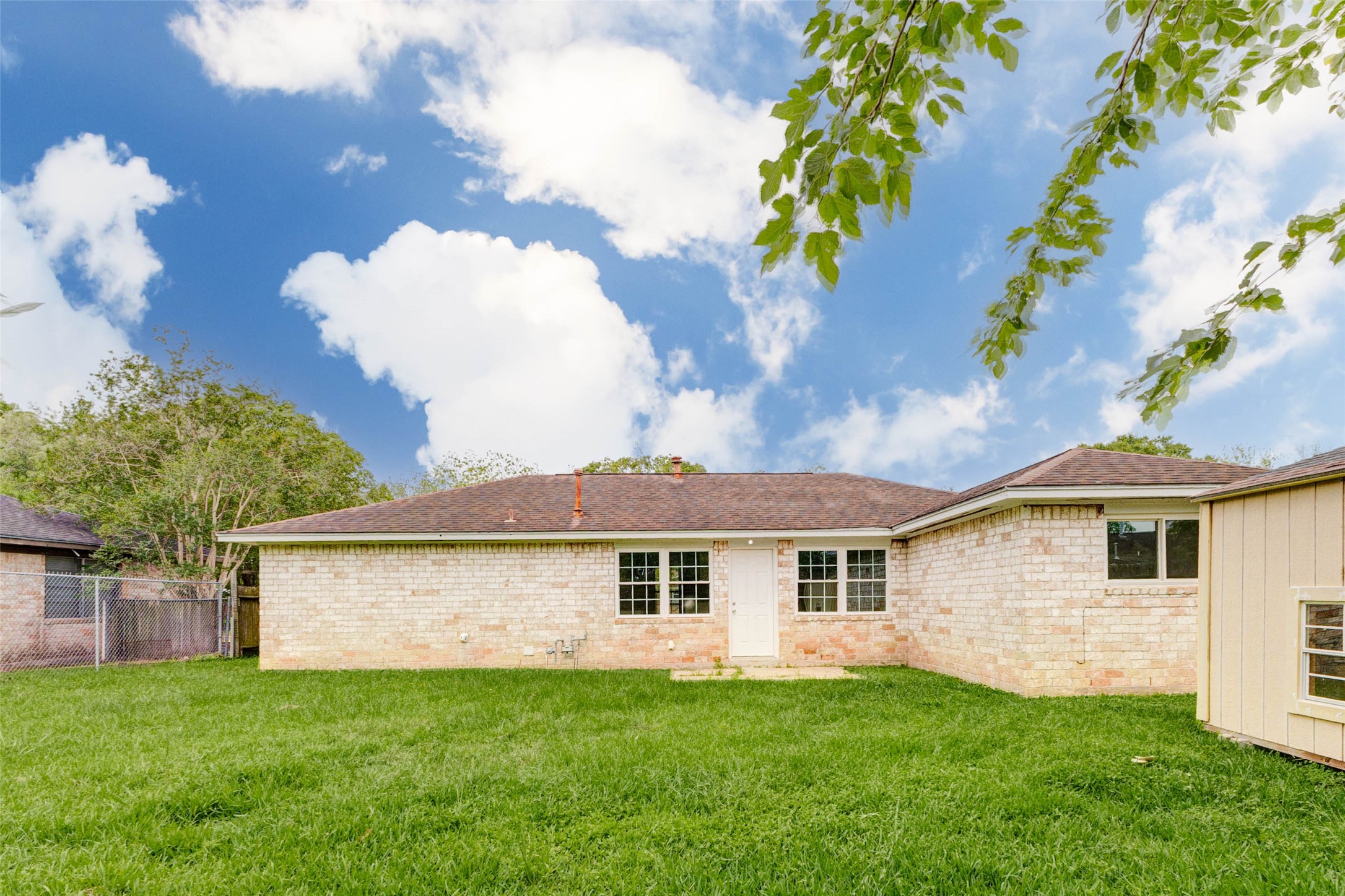 5319 Ridgestone Street Houston, TX 77053 - Photo 25 of 26 a view of a house with a backyard