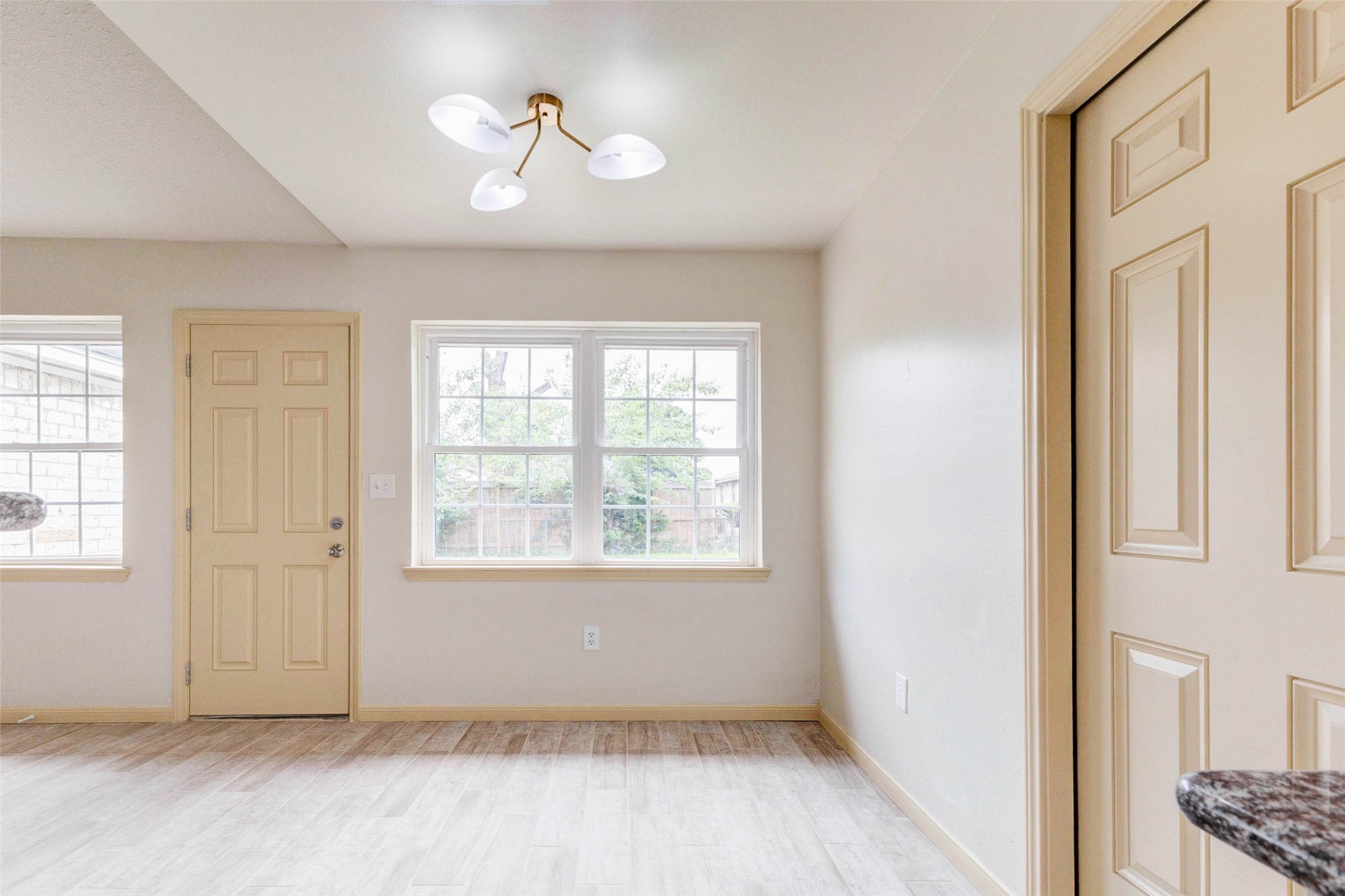 5319 Ridgestone Street Houston, TX 77053 - Photo 8 of 26 a view of an empty room with a window