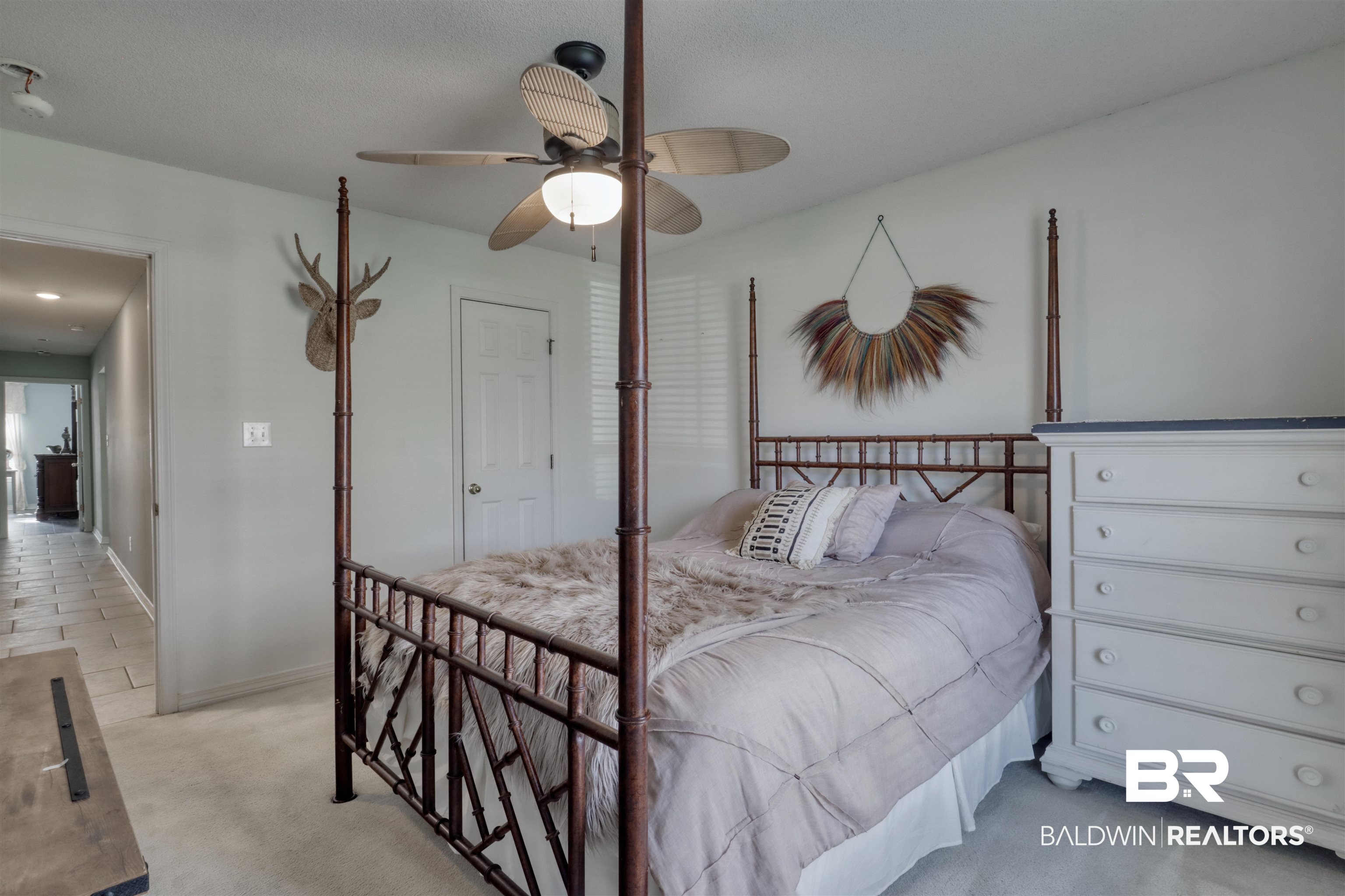 12893 Hunters Chase Foley, AL 36535 - Photo 33 of 42 Bedroom with a ceiling fan, baseboards, and light colored carpet