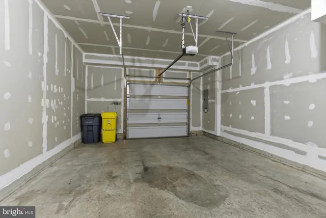 a view of an empty room with a garage