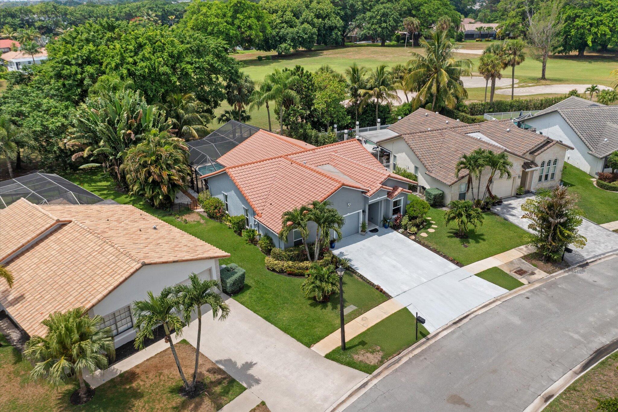 10167 Camelback Lane Boca Raton, FL 33498 - Photo 40 of 55 an aerial view of a house with garden space and street view