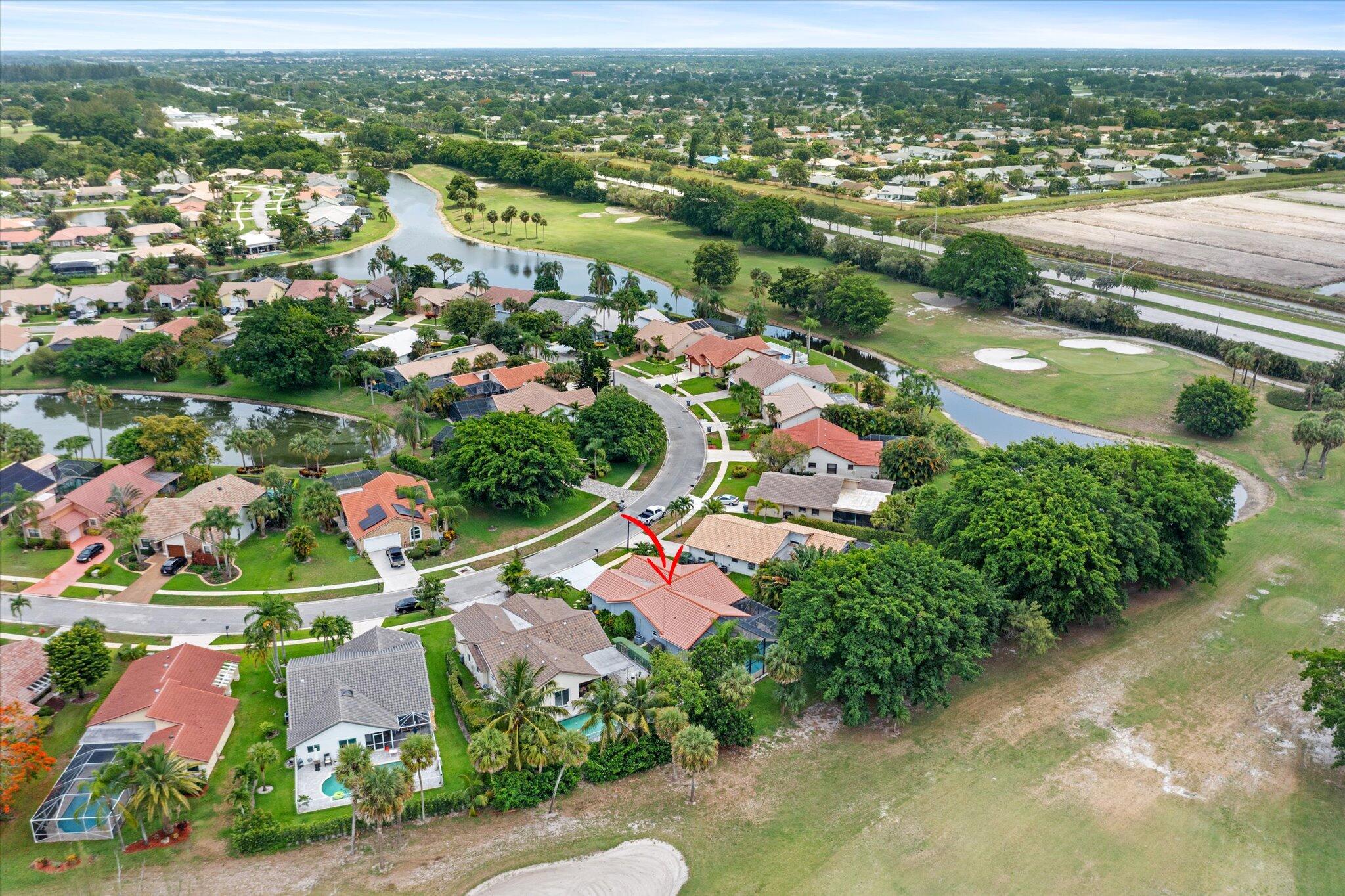 10167 Camelback Lane Boca Raton, FL 33498 - Photo 45 of 55 an aerial view of residential houses with outdoor space and river view