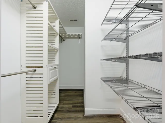 a view of a hallway with a white house