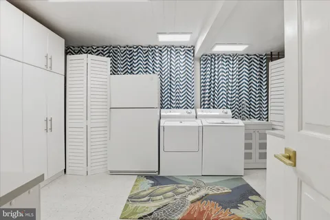 a bathroom with a granite countertop toilet a sink and a bathtub