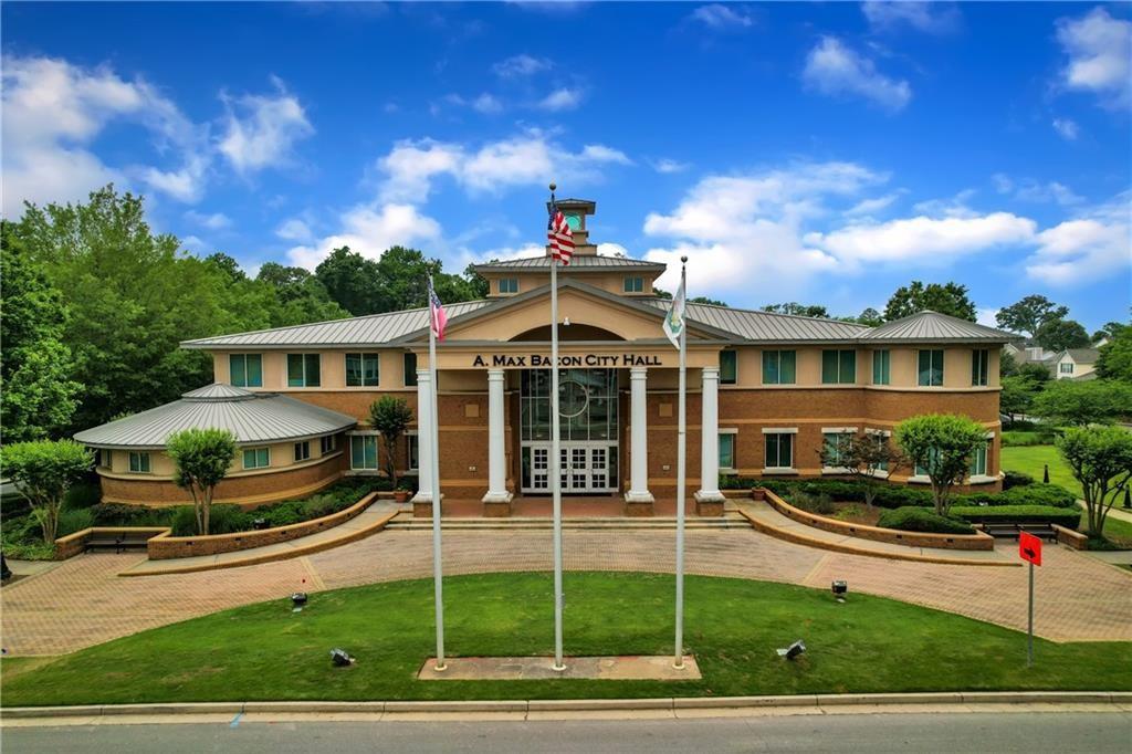 1000 Mathews Court, Unit B Smyrna, GA 30080 - Photo 21 of 42 a front view of a house with a yard