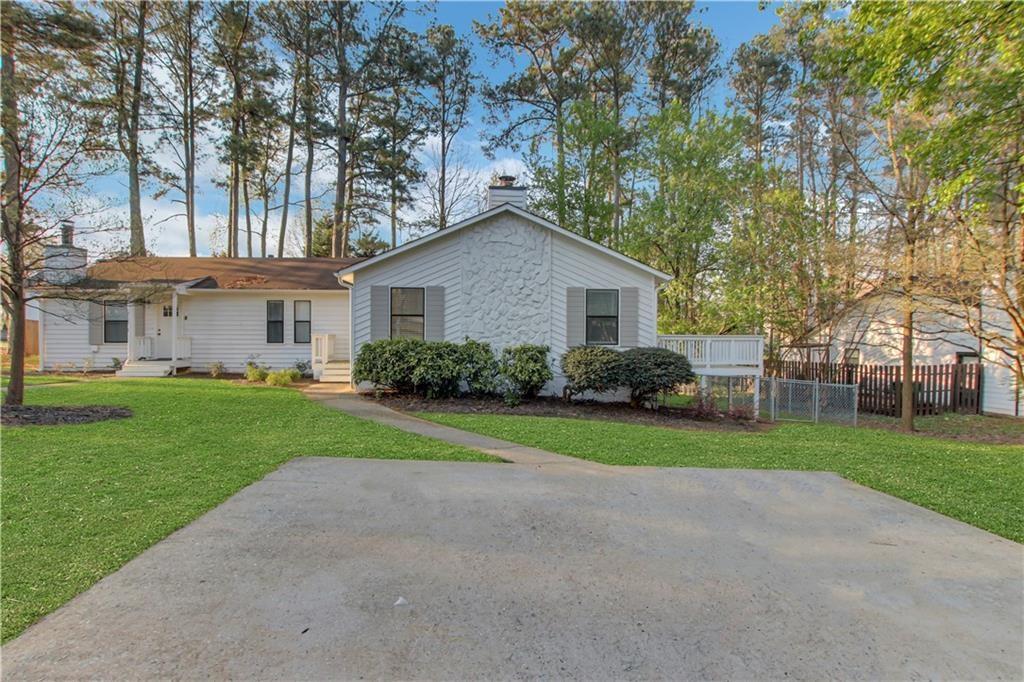 1000 Mathews Court, Unit B Smyrna, GA 30080 - Photo 23 of 42 a front view of house with yard and green space