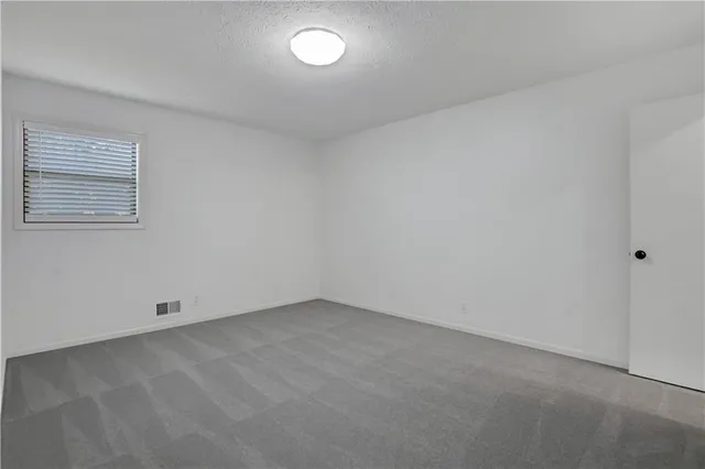 an empty room with an entryway