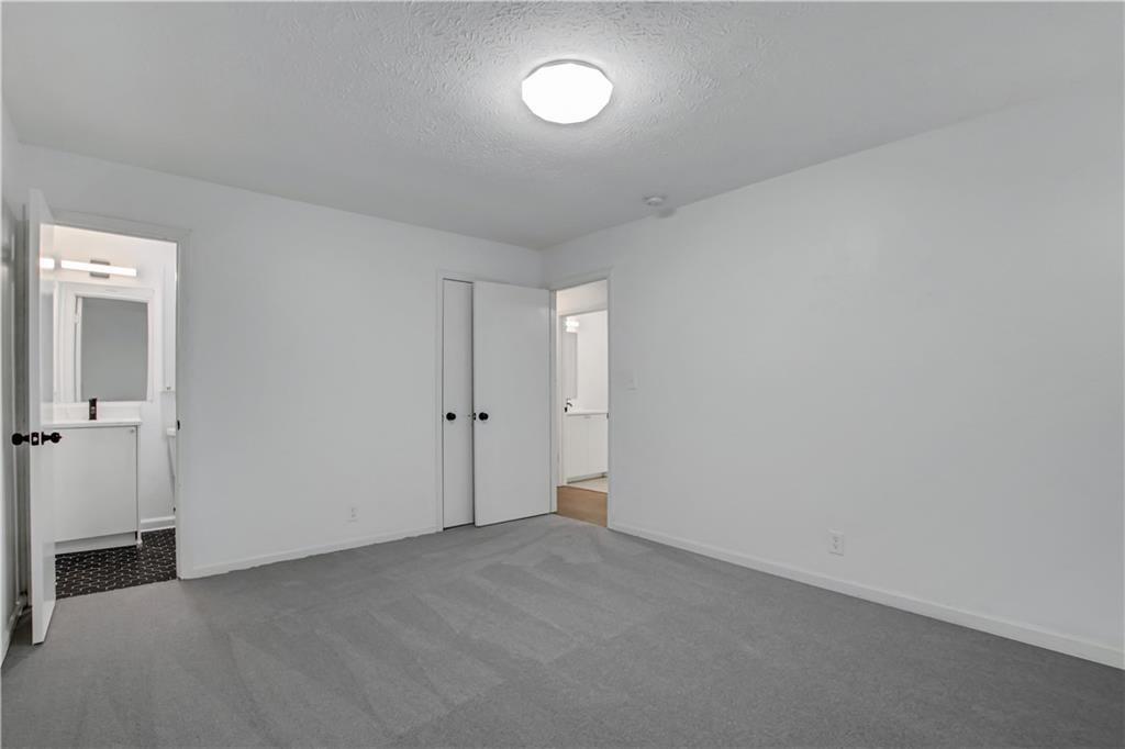 1000 Mathews Court, Unit B Smyrna, GA 30080 - Photo 34 of 42 a view of an empty room and a window