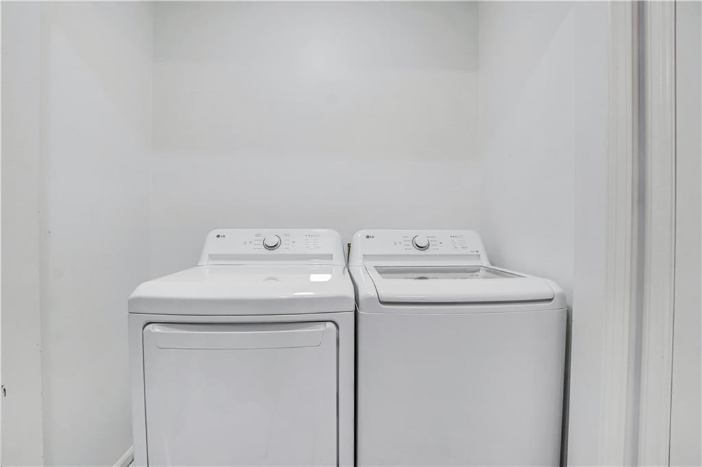 1000 Mathews Court, Unit B Smyrna, GA 30080 - Photo 37 of 42 a utility room with dryer and washer
