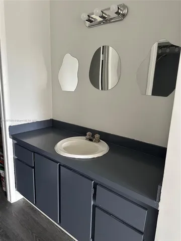 a bathroom with a toilet and a bathtub