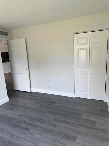 a picture of a door and a window in a room