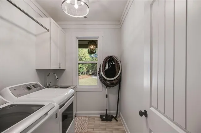 a bathroom with a granite countertop toilet sink and mirror