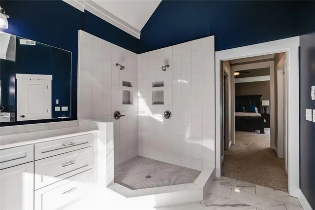 a white bath tub sitting in a bathroom
