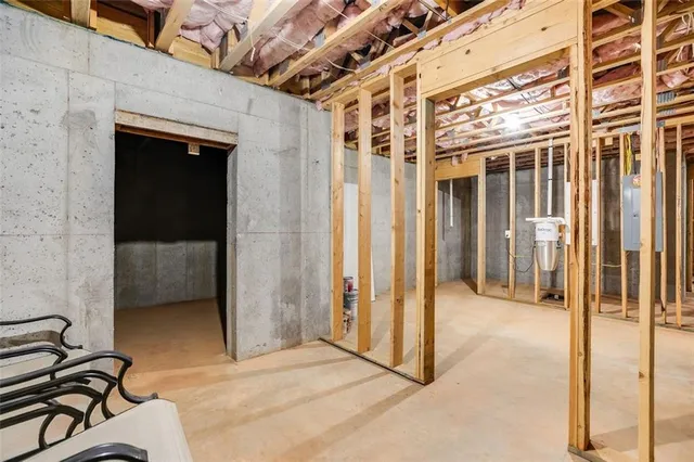 an aerial view of a house with a yard and garden