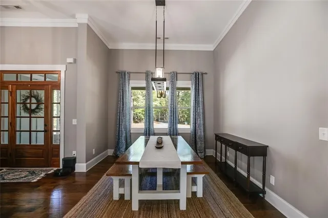 a living room with hard wood floor