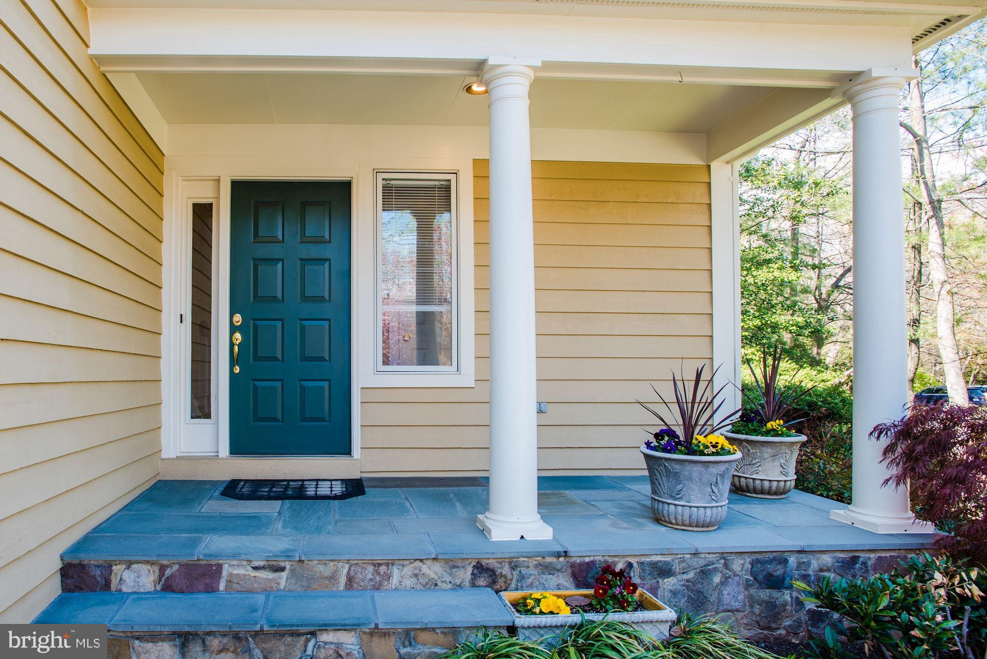 1300 Pavilion Club Way Reston, VA 20194 - Photo 2 of 30 a view of house with patio