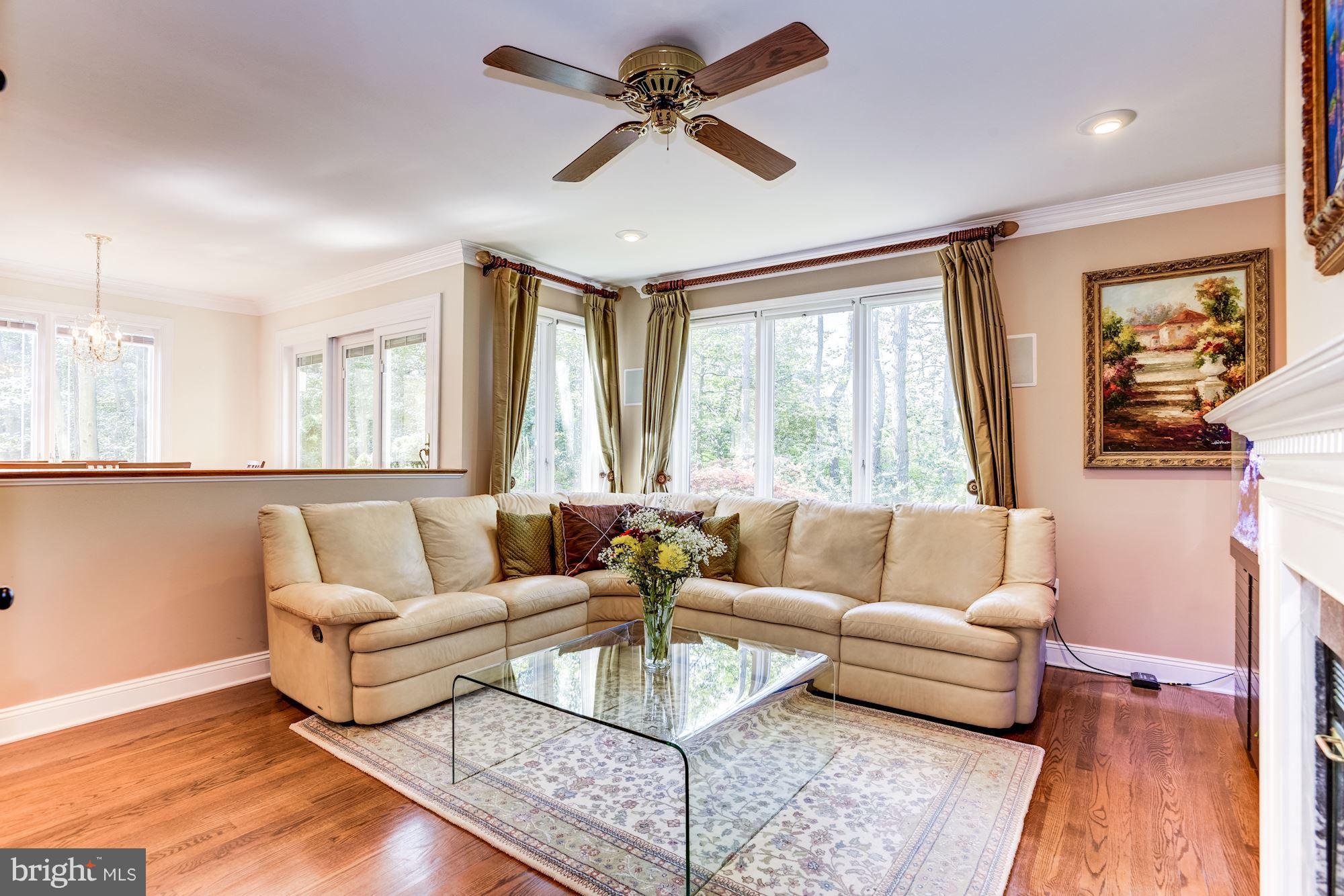 1300 Pavilion Club Way Reston, VA 20194 - Photo 13 of 30 a living room with furniture and a large window