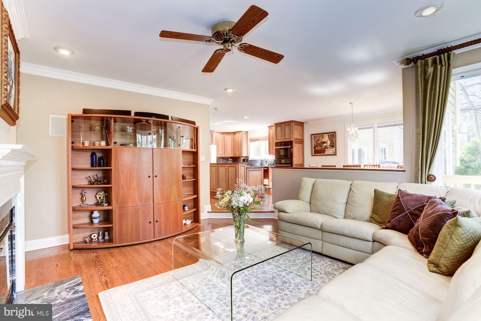 1300 Pavilion Club Way Reston, VA 20194 - Photo 14 of 30 a living room with furniture and a window