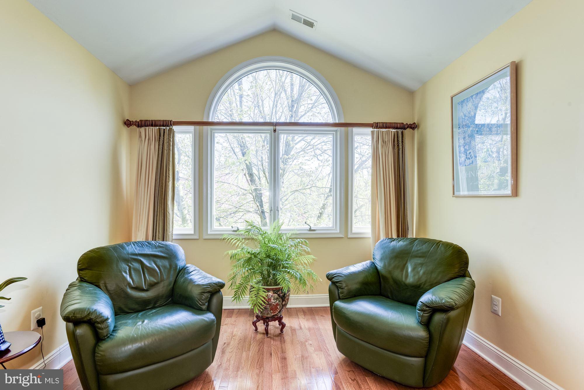 1300 Pavilion Club Way Reston, VA 20194 - Photo 16 of 30 a living room with furniture and a large window