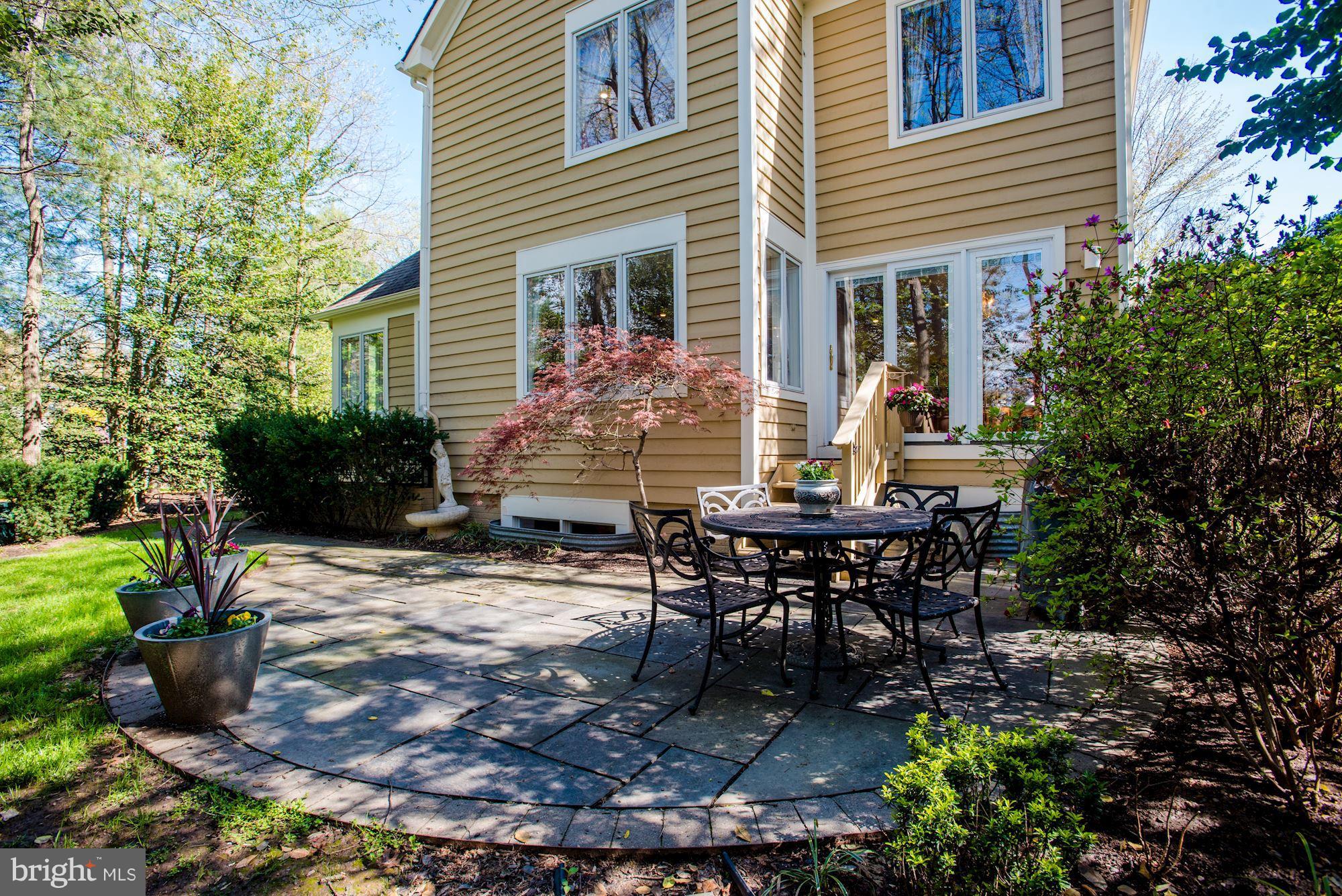 1300 Pavilion Club Way Reston, VA 20194 - Photo 26 of 30 a view of a house with backyard and sitting area