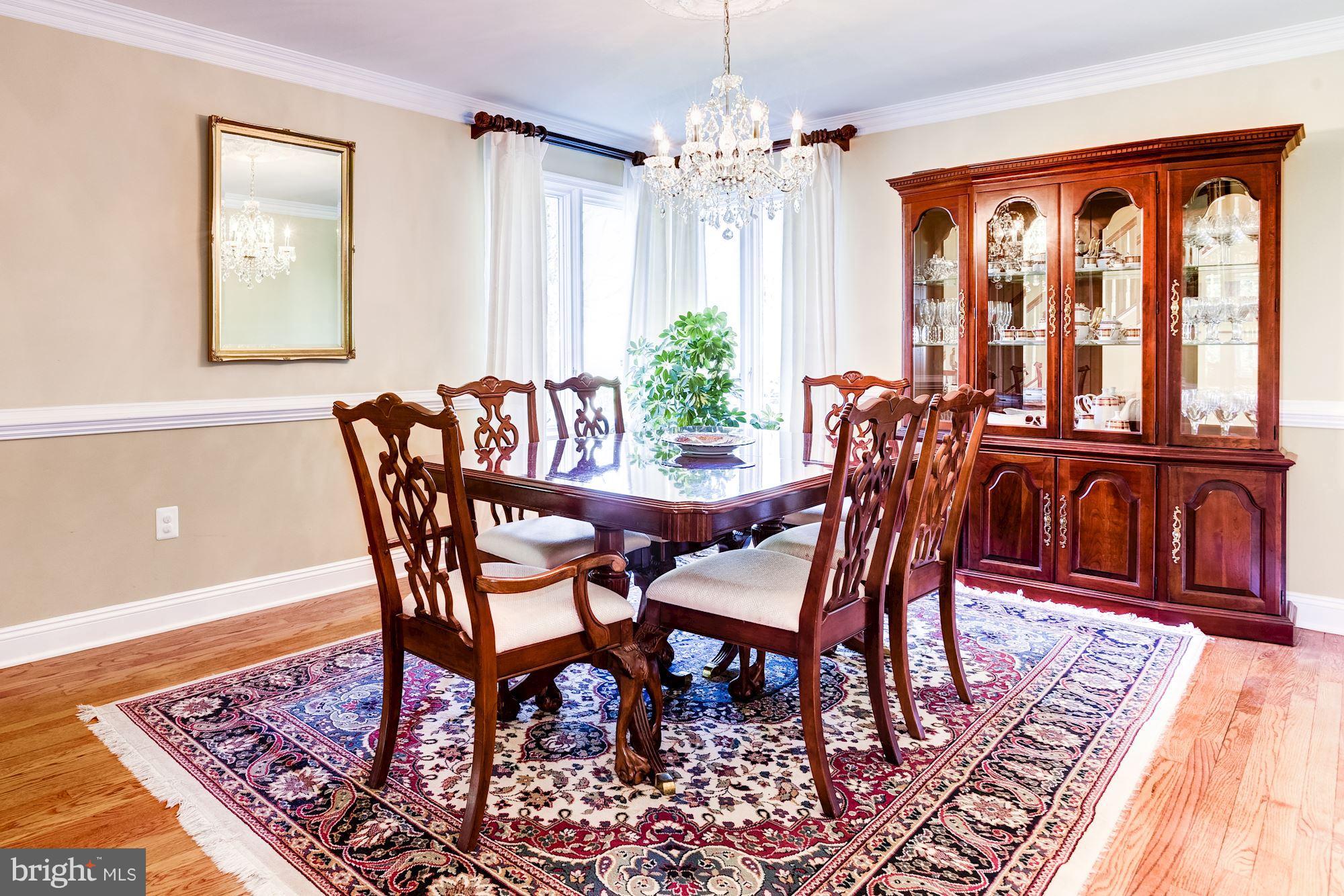1300 Pavilion Club Way Reston, VA 20194 - Photo 6 of 30 a view of a dining room with furniture window and wooden floor