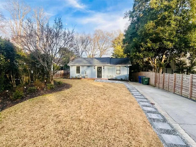 a house with trees in front of it