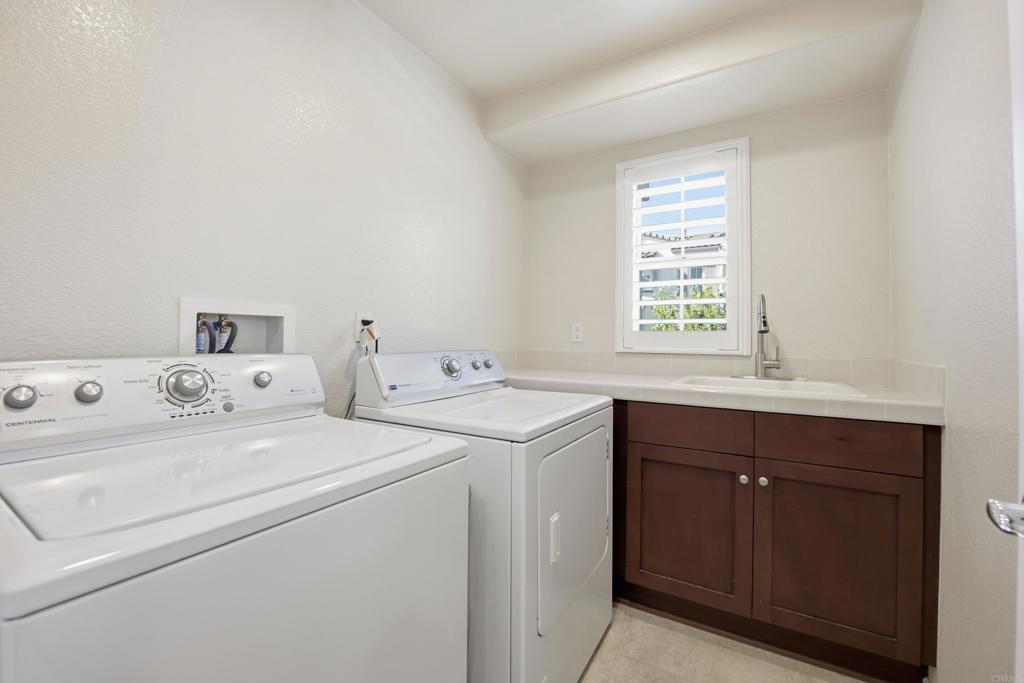 2284 Durango Way, Unit 200 San Marcos, CA 92078 - Photo 21 of 39 a utility room with dryer and washer