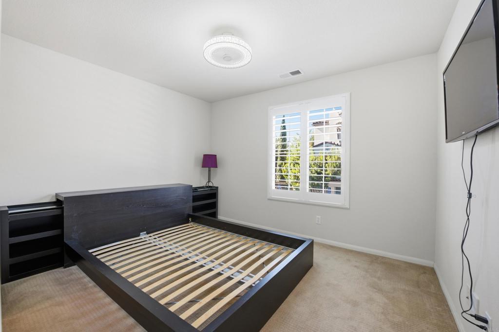 2284 Durango Way, Unit 200 San Marcos, CA 92078 - Photo 27 of 39 a view of room with window and hardwood floor