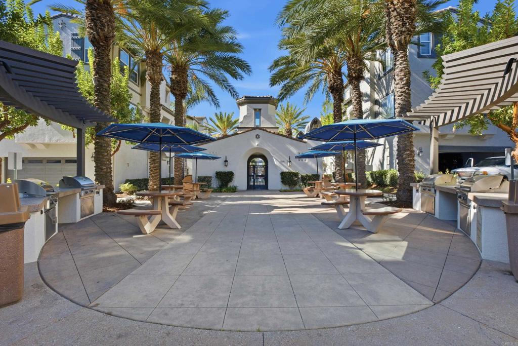 2284 Durango Way, Unit 200 San Marcos, CA 92078 - Photo 31 of 39 a swimming pool with outdoor seating and yard