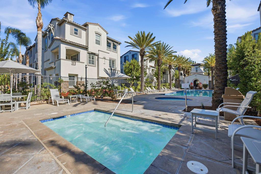 2284 Durango Way, Unit 200 San Marcos, CA 92078 - Photo 33 of 39 a view of a swimming pool with chairs