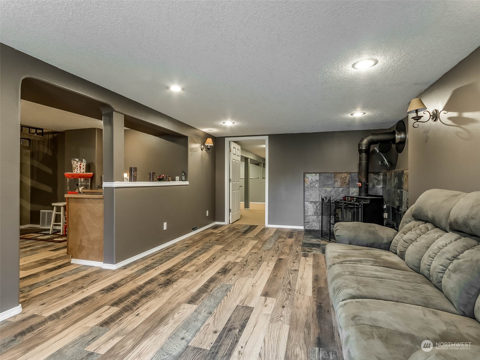 6 White Road Raymond, WA 98577 - Photo 12 of 40 a view of a livingroom with furniture and a ceiling fan