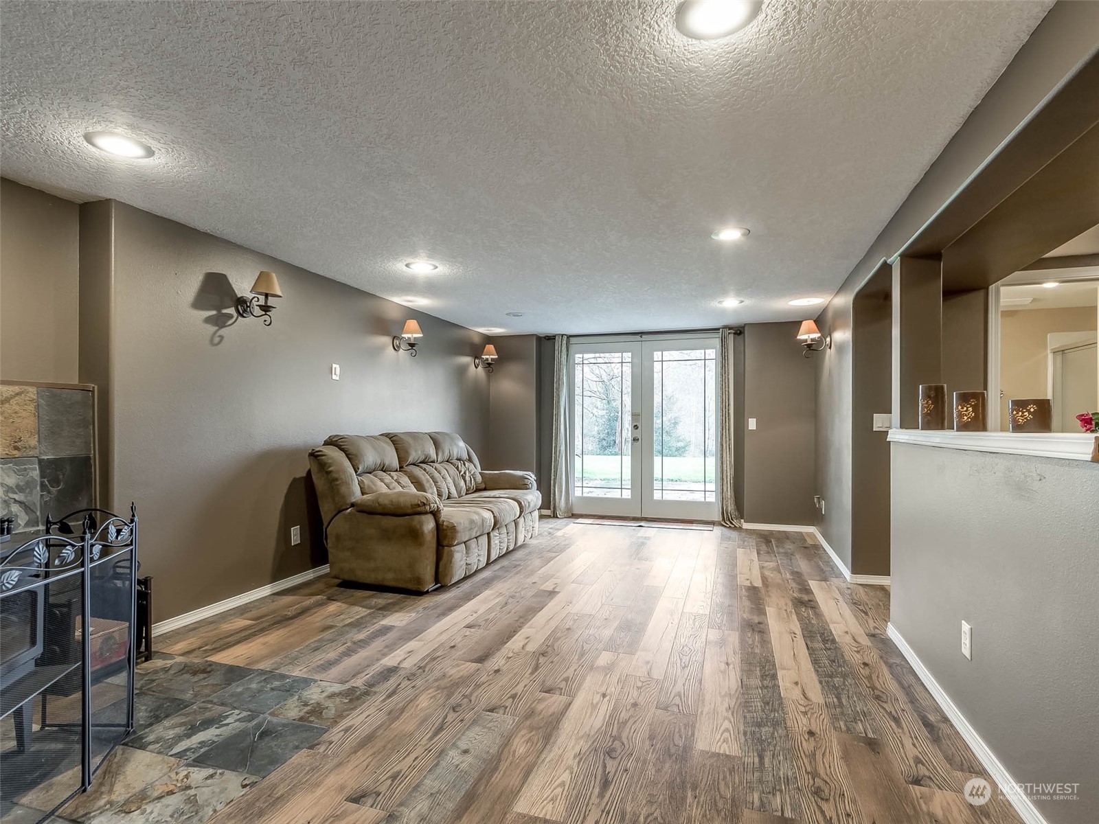 6 White Road Raymond, WA 98577 - Photo 14 of 40 a view of a livingroom with furniture and windows