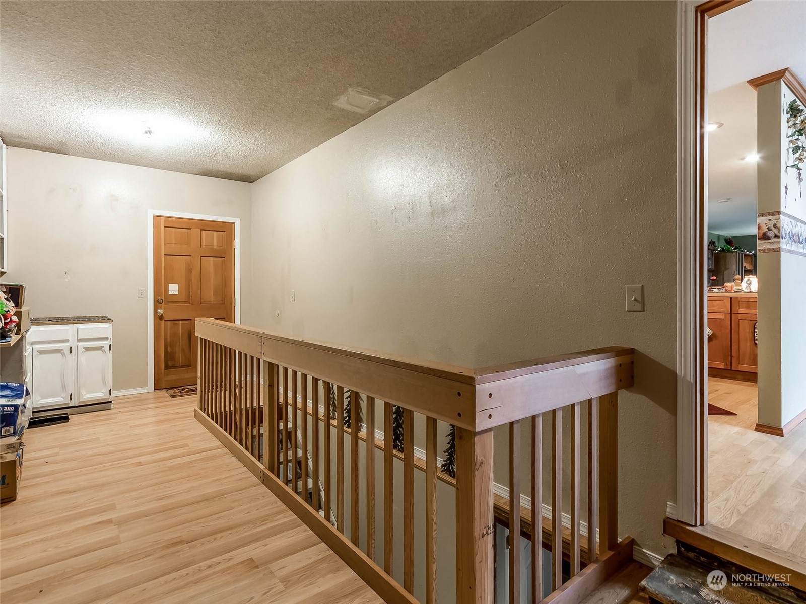6 White Road Raymond, WA 98577 - Photo 27 of 40 a view of a hallway with a kitchen