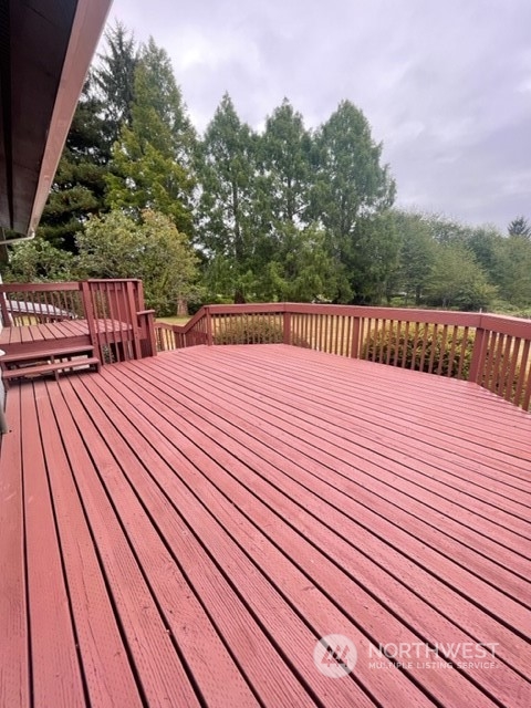 6 White Road Raymond, WA 98577 - Photo 38 of 40 a balcony with wooden floor