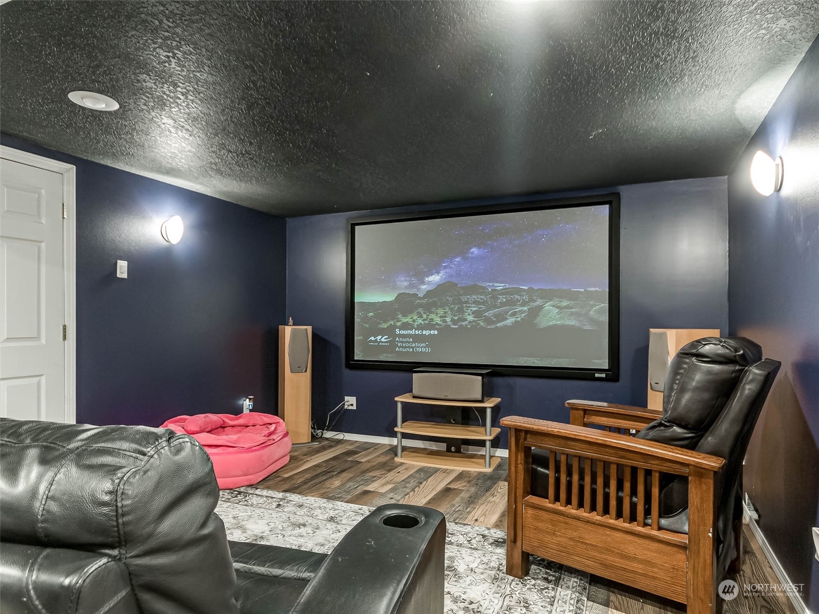 6 White Road Raymond, WA 98577 - Photo 6 of 40 a projector room with furniture