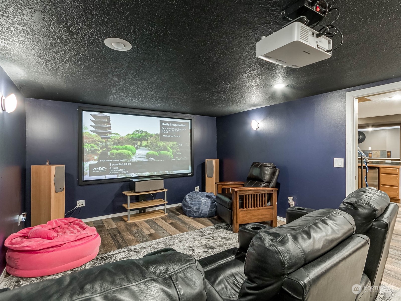 6 White Road Raymond, WA 98577 - Photo 7 of 40 a room with furniture and a flat screen tv