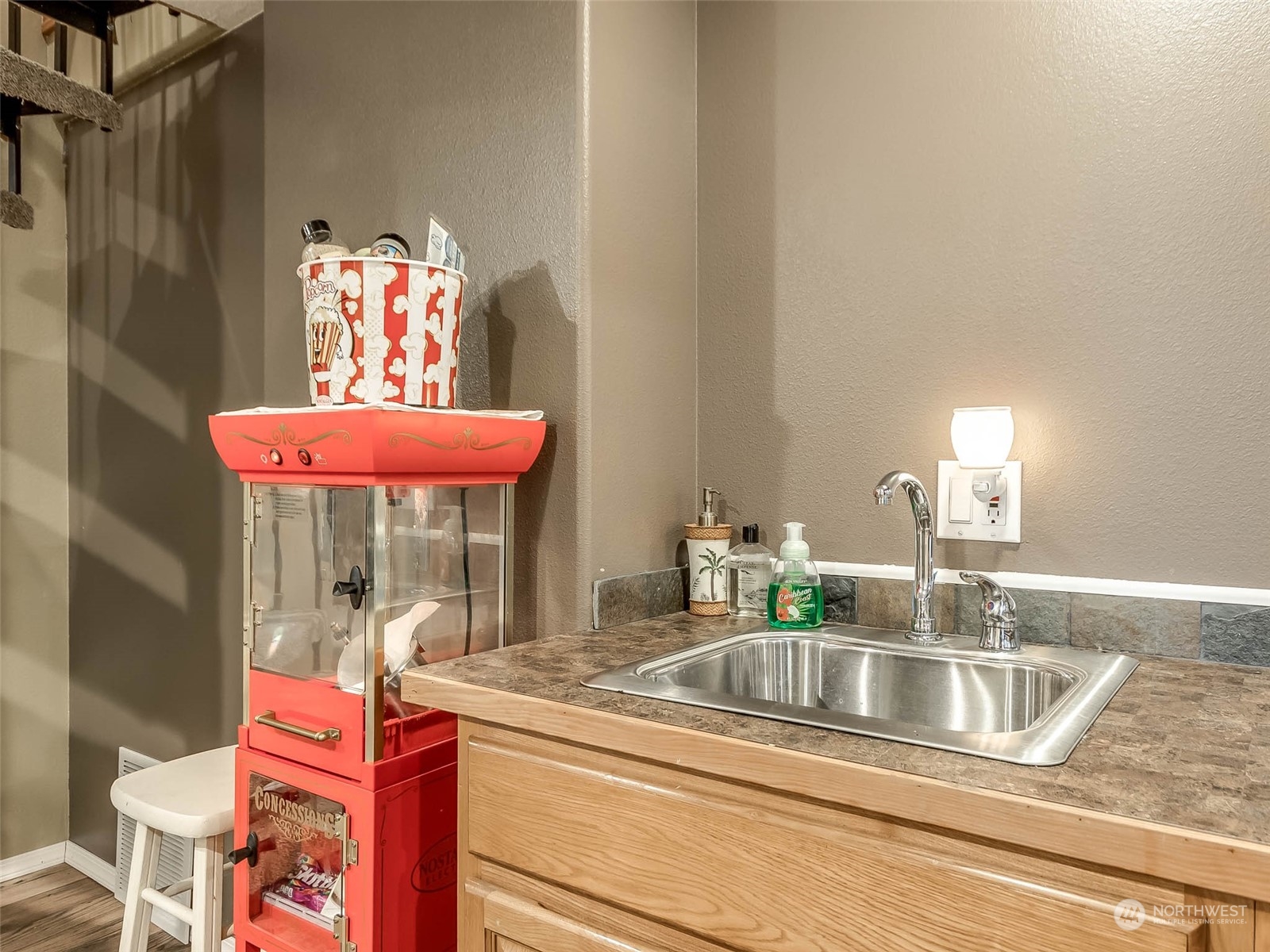 6 White Road Raymond, WA 98577 - Photo 10 of 40 a kitchen with a sink cabinets and a potted plant
