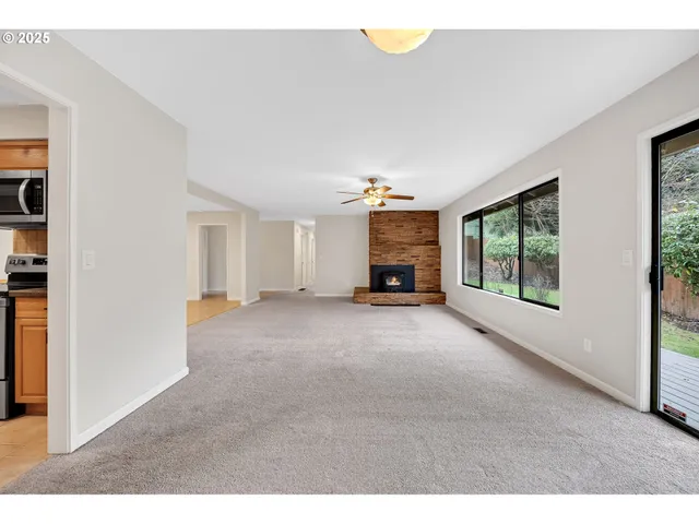 a view of livingroom with furniture and window