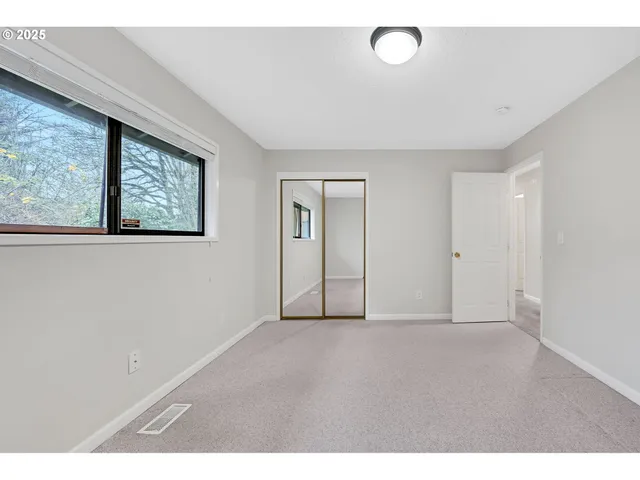 a view of an empty room with window