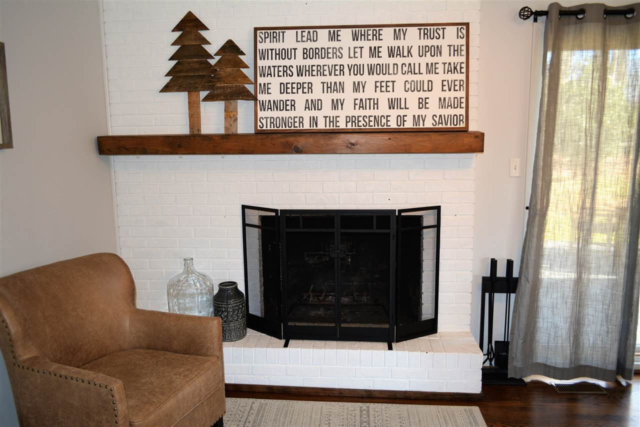 204 Winterlochen Road Raleigh, NC 27603 - Photo 10 of 28 Wow the white brick fireplace is awesome!