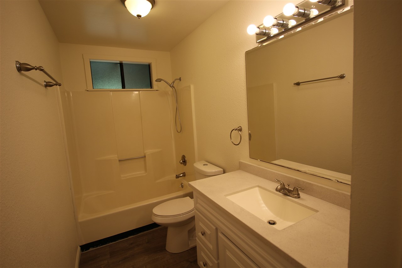 1000 Kauhikoa Road Haiku, HI 96708 - Photo 15 of 17 a bathroom with a sink toilet and shower