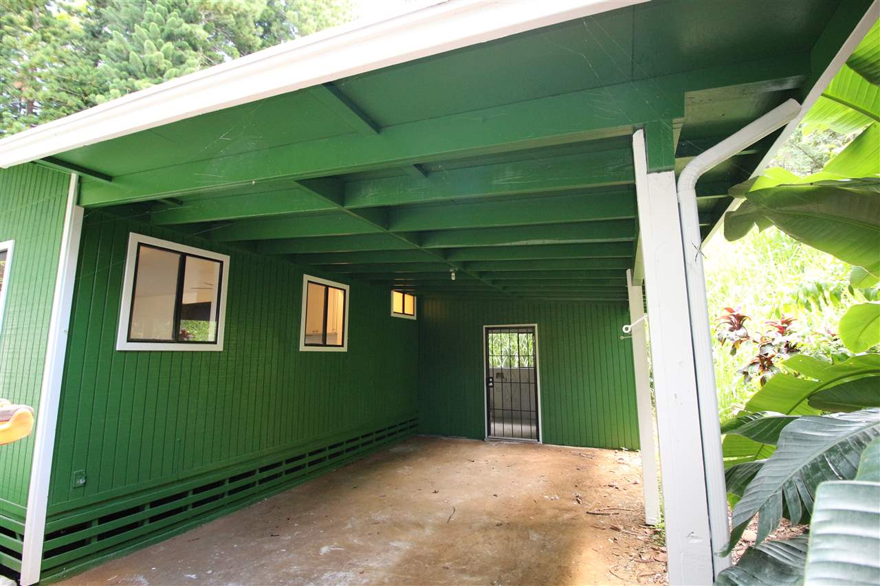 1000 Kauhikoa Road Haiku, HI 96708 - Photo 3 of 17 a view of a house with a backyard
