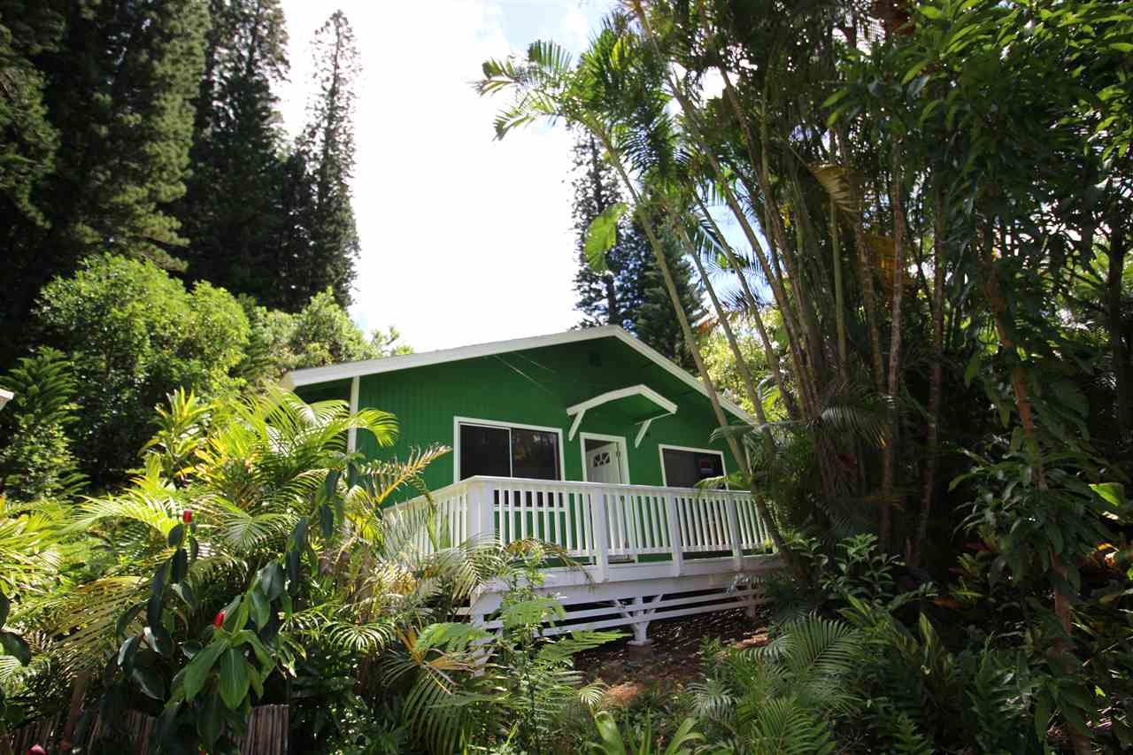 1000 Kauhikoa Road Haiku, HI 96708 - Photo 4 of 17 a view of house with a yard