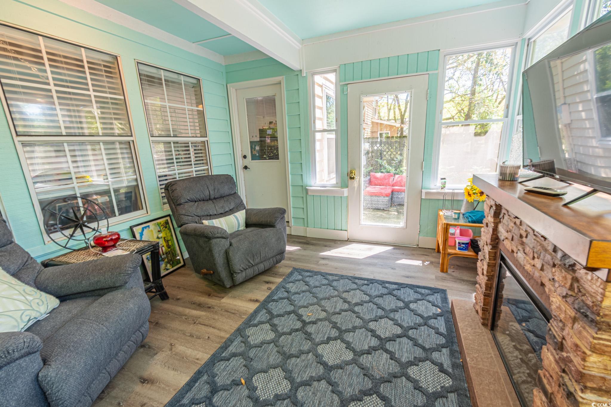 675 Mariner Avenue Murrells Inlet, SC 29576 - Photo 15 of 27 Sunroom / solarium with beamed ceiling and wood finished floors