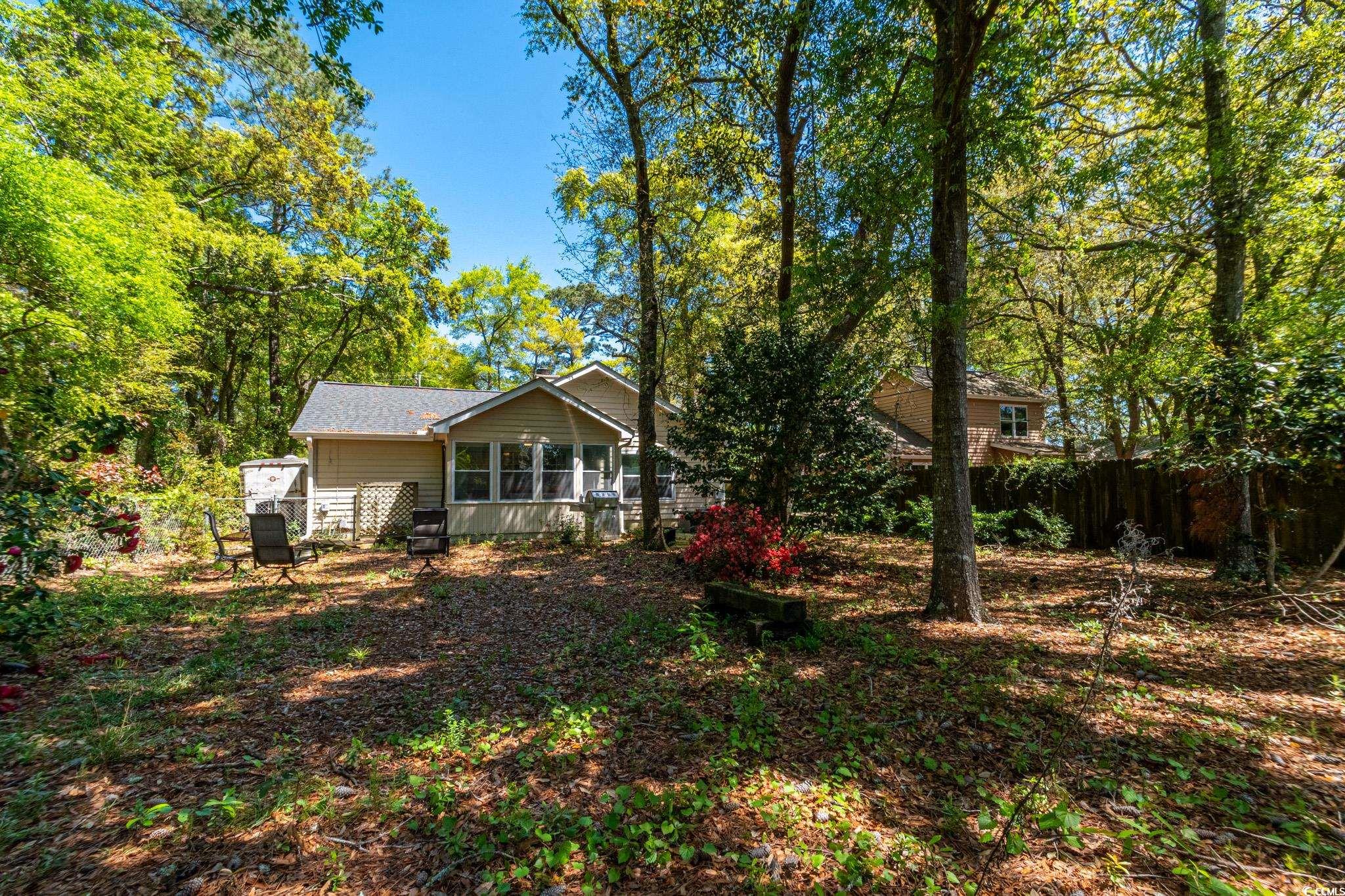 675 Mariner Avenue Murrells Inlet, SC 29576 - Photo 20 of 27 View of yard featuring fence